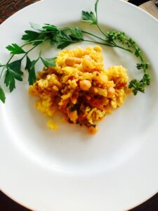 Zucchini and Garbanzo stew on saffron rice for Meatless Monday